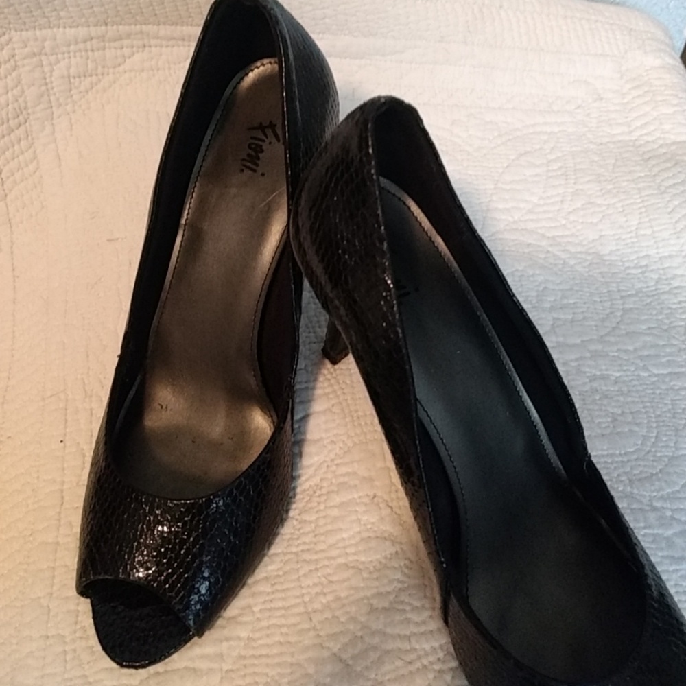 Gently worn pumps